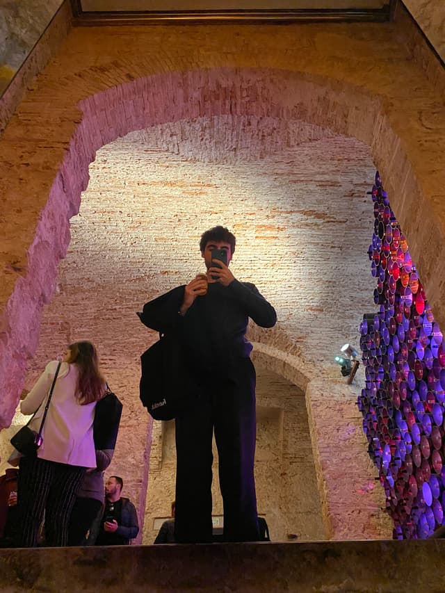 Me at Rev/Dev, holding a Moritz beer